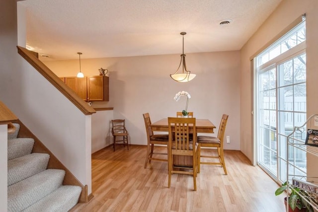 dining room featuring light wood-type flooring