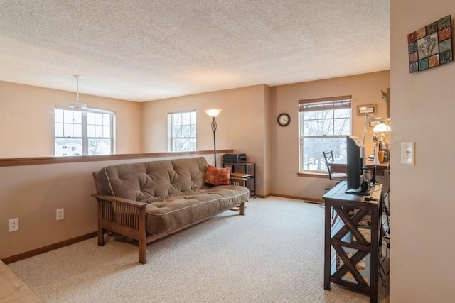 living room with light carpet and a textured ceiling