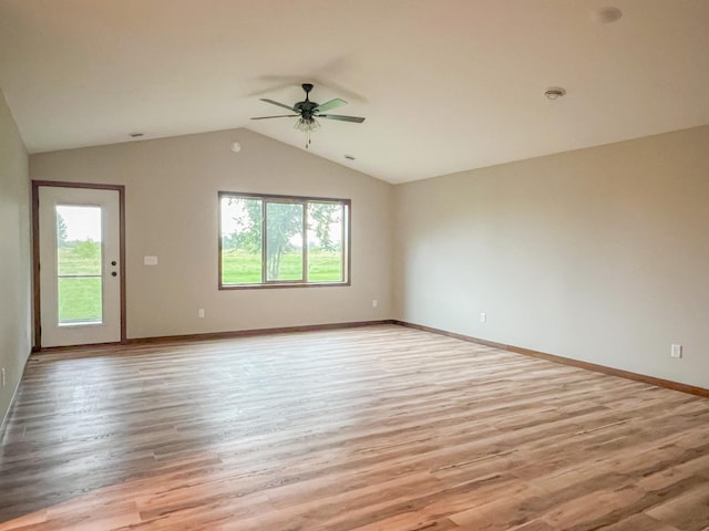 unfurnished room with light hardwood / wood-style floors, ceiling fan, and lofted ceiling