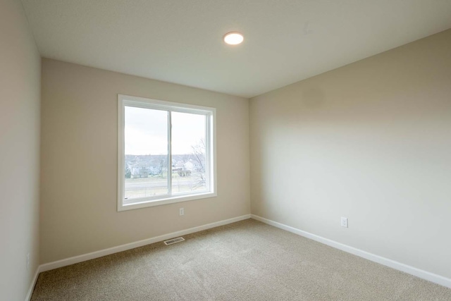 empty room with carpet floors