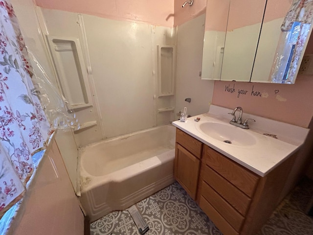 bathroom featuring vanity and shower / bathtub combination