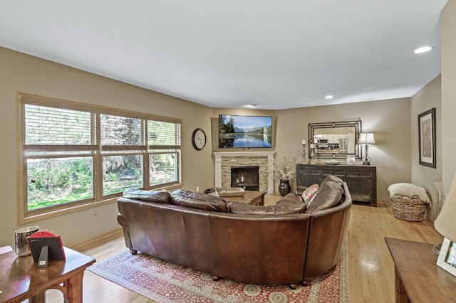 2567 Bridle Creek Trl, Chanhassen, MN 55317 - living room featuring light wood-style flooring, a fireplace, and recessed lighting