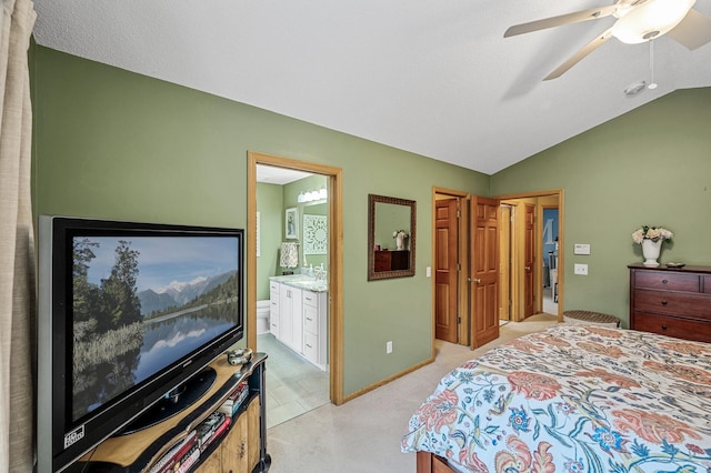 2567 Bridle Creek Trl, Chanhassen, MN 55317 - bedroom with lofted ceiling, connected bathroom, ceiling fan, and light carpet