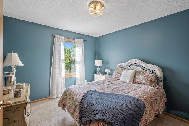 2567 Bridle Creek Trl, Chanhassen, MN 55317 - bedroom featuring carpet flooring, a textured ceiling, and a chandelier