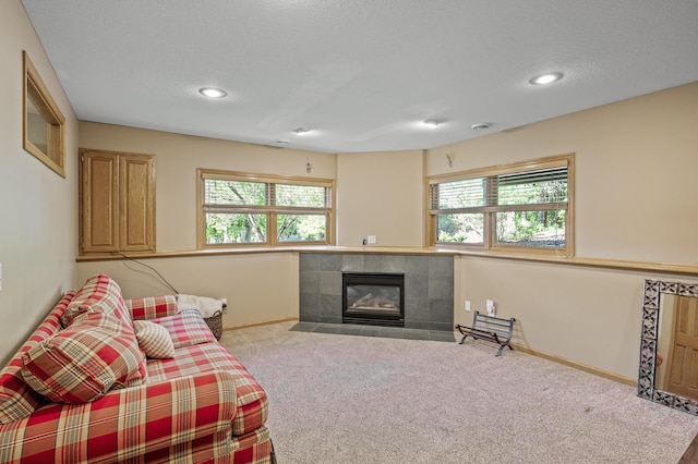 2567 Bridle Creek Trl, Chanhassen, MN 55317 - carpeted living area featuring plenty of natural light, a fireplace, and recessed lighting