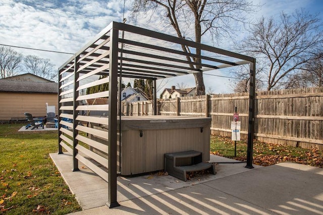 view of patio / terrace featuring a hot tub