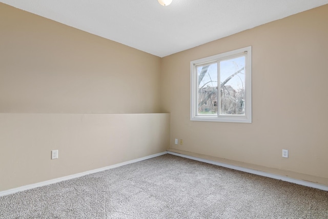 empty room featuring carpet flooring