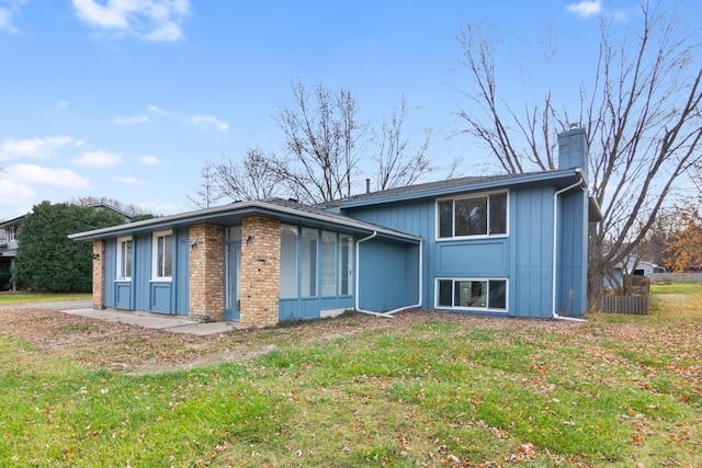 exterior space with a front lawn