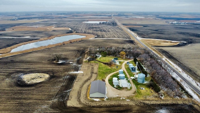 birds eye view of property featuring a rural view