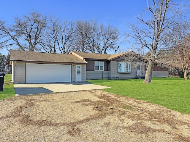 ranch-style home with a garage and a front yard