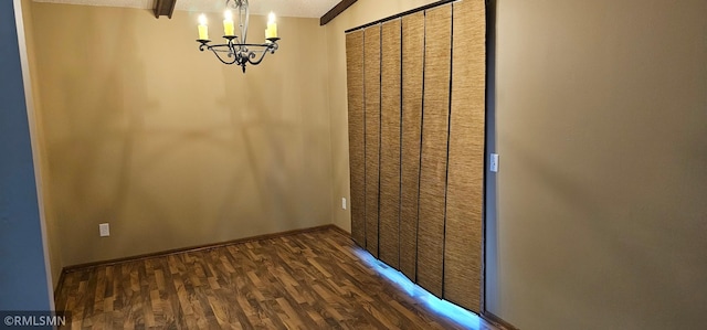 9725 Thomas Ave N, Brooklyn Park, MN 55444 - corridor with a chandelier, dark wood-style floors, and a textured ceiling