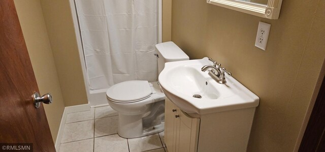 9725 Thomas Ave N, Brooklyn Park, MN 55444 - bathroom featuring tile patterned flooring, a shower with curtain, and vanity