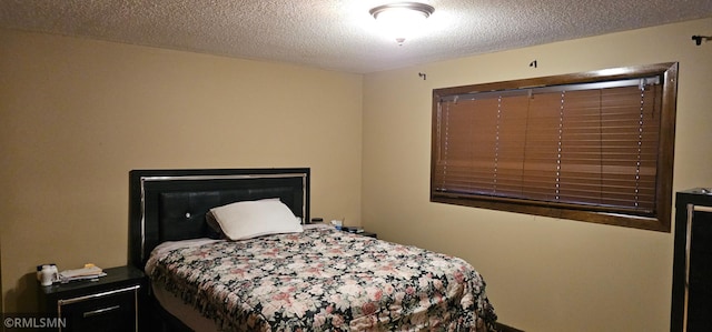 9725 Thomas Ave N, Brooklyn Park, MN 55444 - bedroom with a textured ceiling