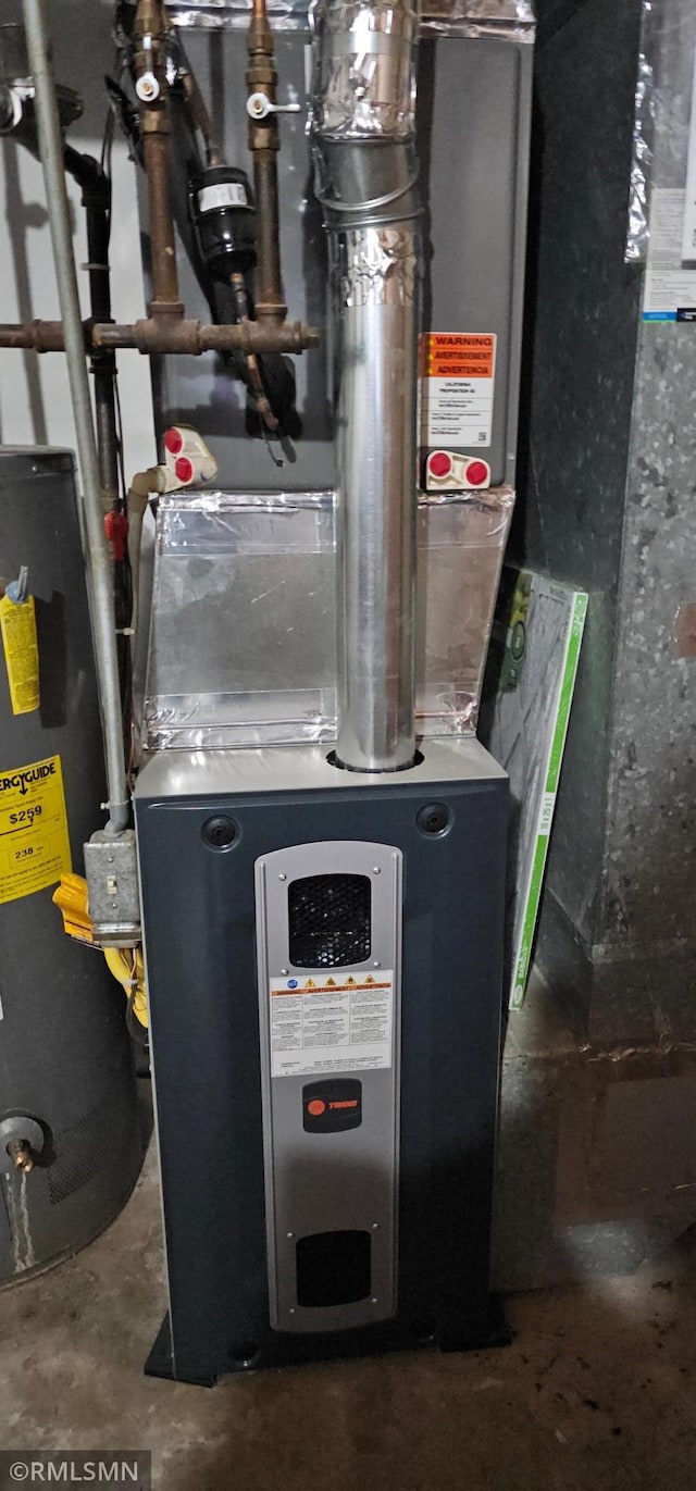 9725 Thomas Ave N, Brooklyn Park, MN 55444 - utilities with water heater and heating unit