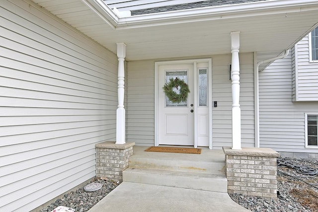 doorway to property with a porch