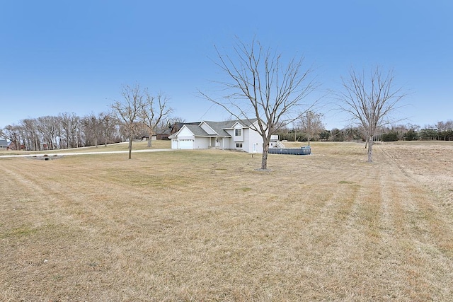 view of yard with an attached garage