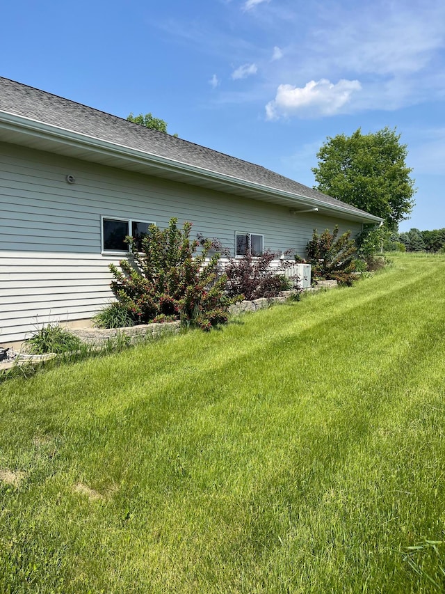 35684 219th Ave, Albany, MN 56307 - view of property exterior featuring a lawn and a shingled roof