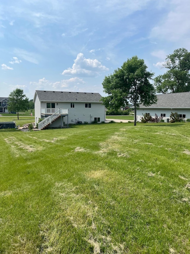 35684 219th Ave, Albany, MN 56307 - rear view of house with stairs and a yard