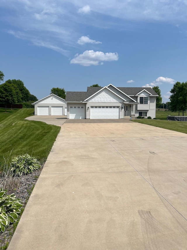 35684 219th Ave, Albany, MN 56307 - view of front facade featuring driveway, a front yard, and an attached garage