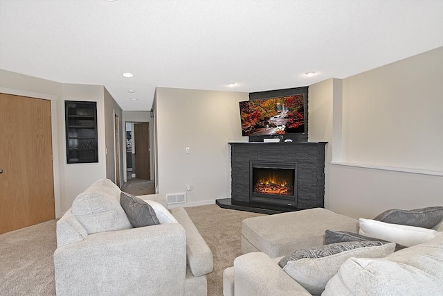 35684 219th Ave, Albany, MN 56307 - carpeted living room featuring a fireplace and recessed lighting
