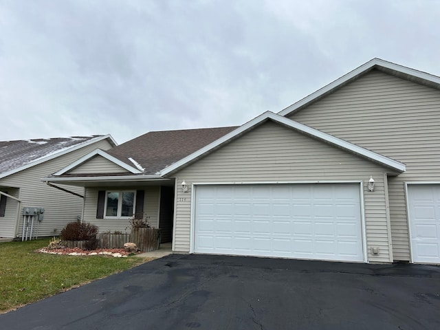 ranch-style house with a garage