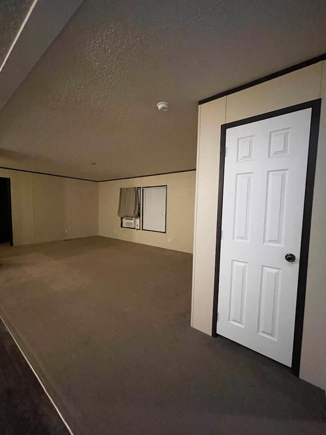 interior space with a textured ceiling