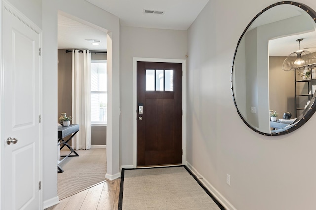 entrance foyer featuring light hardwood / wood-style floors