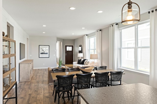 dining area featuring dark hardwood / wood-style floors