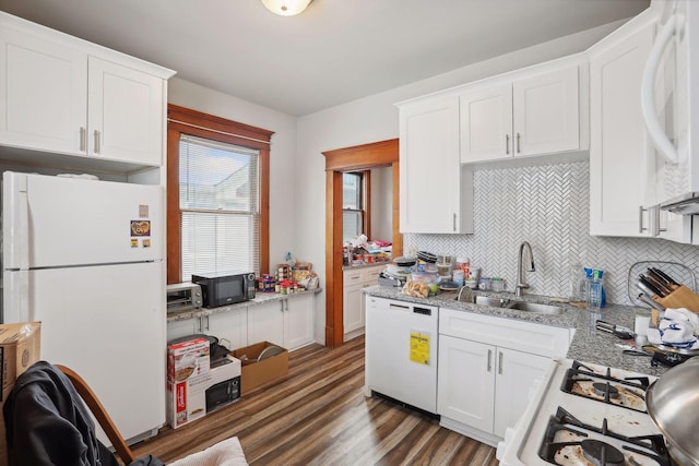 kitchen featuring dark hardwood / wood-style floors, white cabinetry, and white appliances