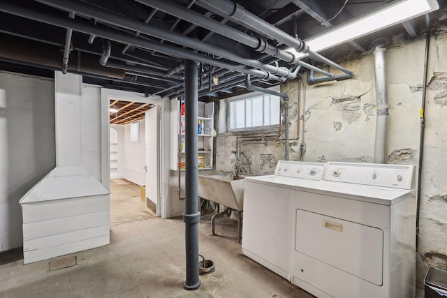 basement featuring washer and dryer