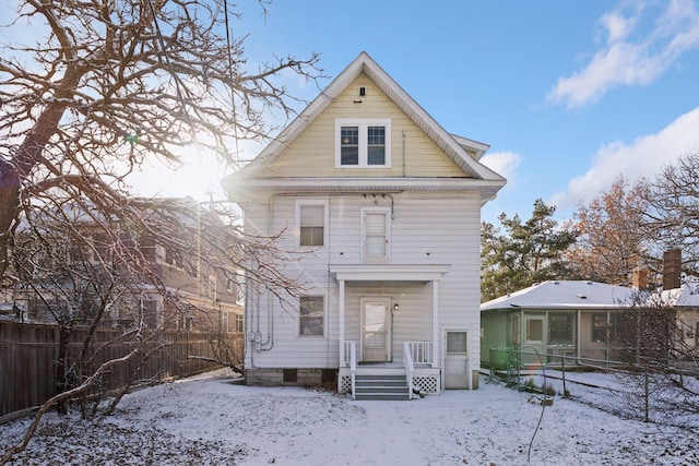 view of snow covered property