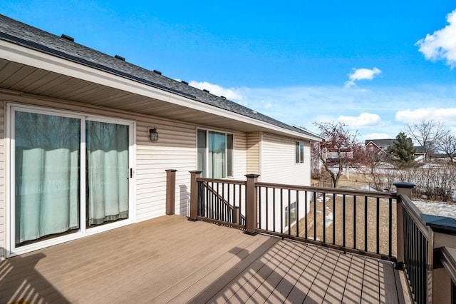 view of snow covered deck