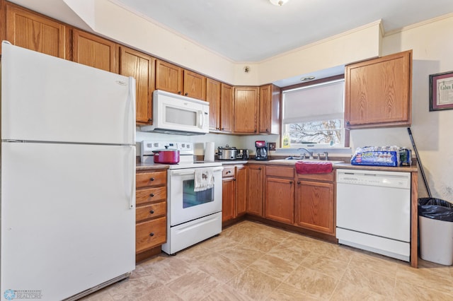 kitchen featuring white appliances, sink, and ornamental molding