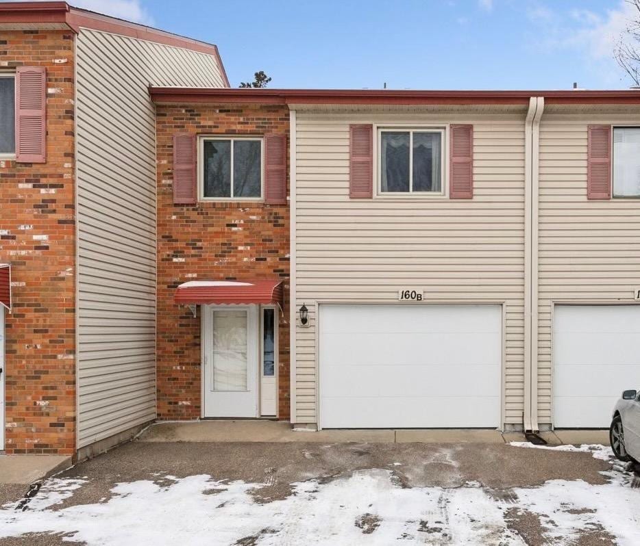 view of property featuring a garage