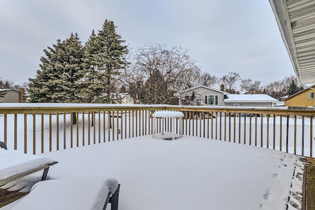 view of snow covered deck