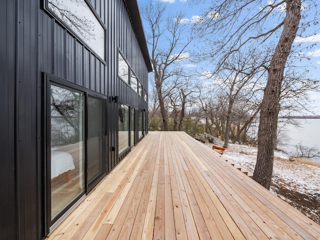 view of snow covered deck