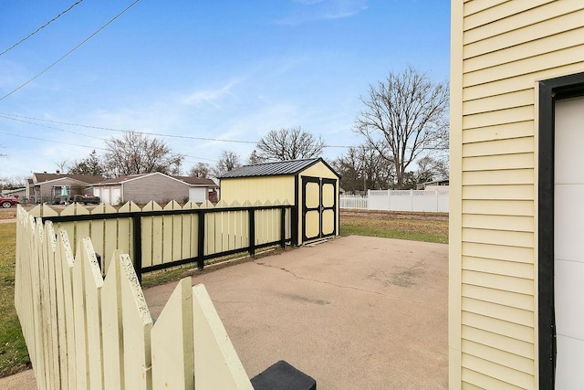 view of patio / terrace with a storage unit