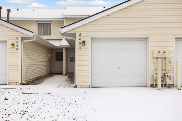 exterior space with a garage