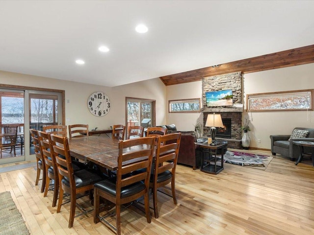 dining space with plenty of natural light and light hardwood / wood-style floors