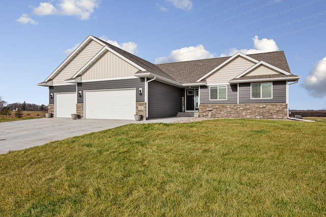 craftsman-style home with a front yard and a garage