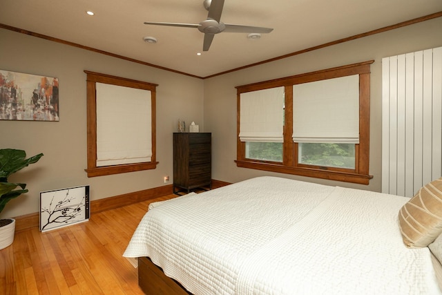 bedroom with light wood-style flooring, recessed lighting, a ceiling fan, baseboards, and ornamental molding