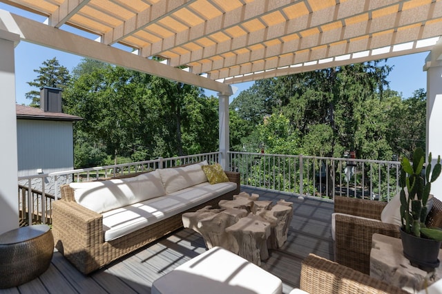 wooden deck featuring an outdoor hangout area and a pergola