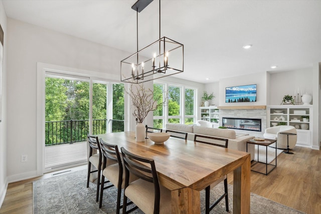 dining area with light hardwood / wood-style flooring