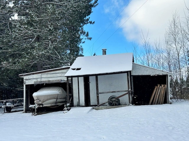 view of snow covered garage