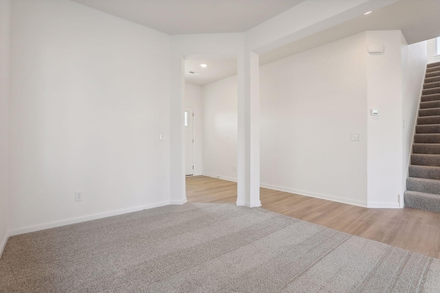 spare room featuring light wood-type flooring