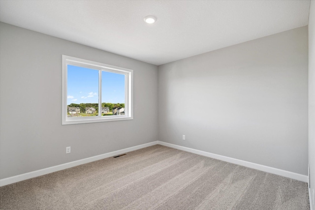 view of carpeted spare room