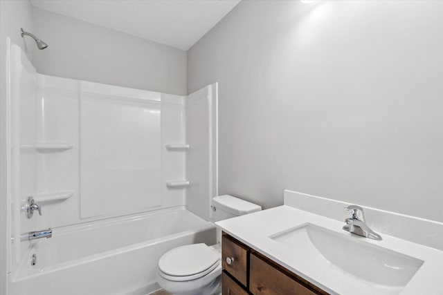 full bathroom featuring bathing tub / shower combination, vanity, and toilet