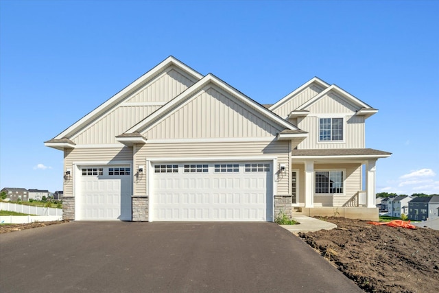 craftsman inspired home featuring a garage