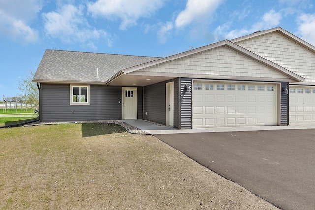 ranch-style house with a garage