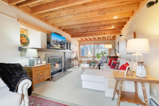 tiled living area with beam ceiling, wooden ceiling, and a fireplace with flush hearth